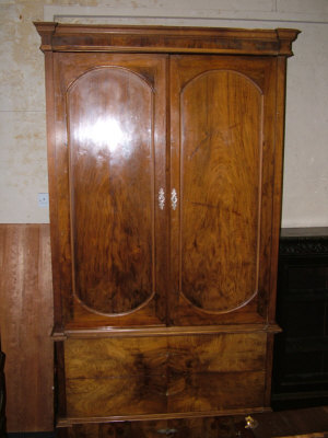 Appraisal: A walnut Armoire early th century the moulded cornice above