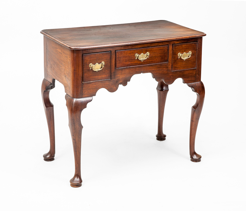 Appraisal: GEORGE II CARVED MAHOGANY LOW BOY in x in x