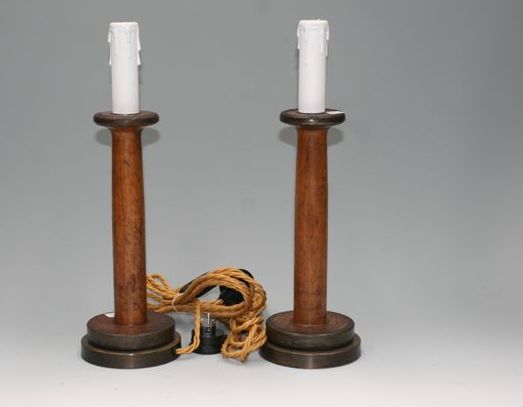 Appraisal: A pair of table lamps made from industrial spindles wired