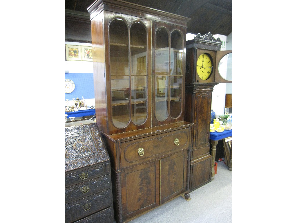 Appraisal: Regency mahogany secretaire bookcase the glazed top above deep drawer