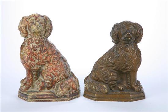 Appraisal: TWO POTTERY DOGS American early th century yellow clay Similar