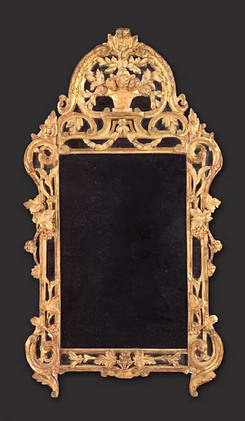 Appraisal: The rectangular plate surmounted by an arched pierced crest carved