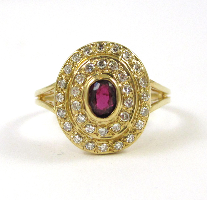 Appraisal: RUBY DIAMOND AND FOURTEEN KARAT GOLD RING with two rows