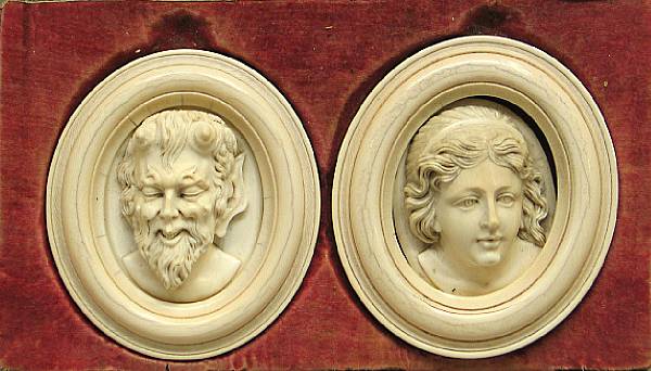 Appraisal: A pair of European carved ivory masks of a bacchante