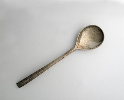 Appraisal: By Omar Ramsden a modern spoon with a hammered finish