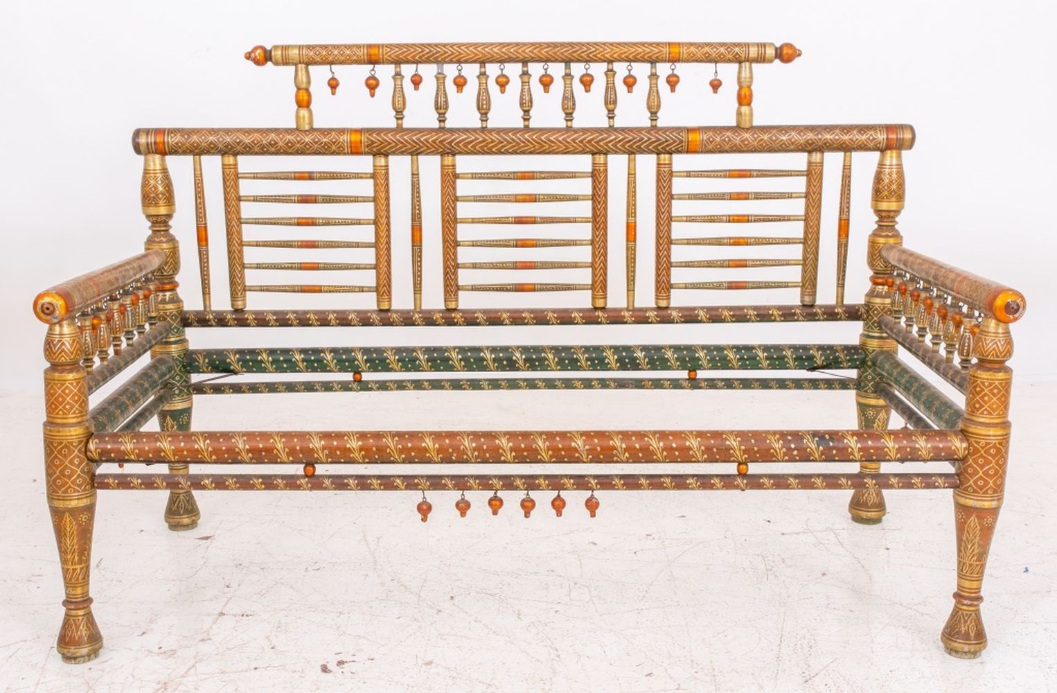 Appraisal: ANGLO-INDIAN SANKHEDA POLYCHROME AND GILT SOFA C Anglo-Indian Sankheda polychrome