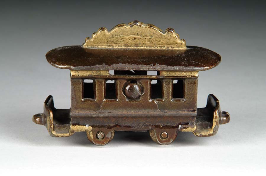 Appraisal: TINY TROLLEY STILL BANK This bank is attributed to Shimer