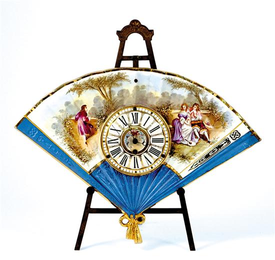 Appraisal: Unusual French fan-form clock circa ornately painted fan depicting romantic