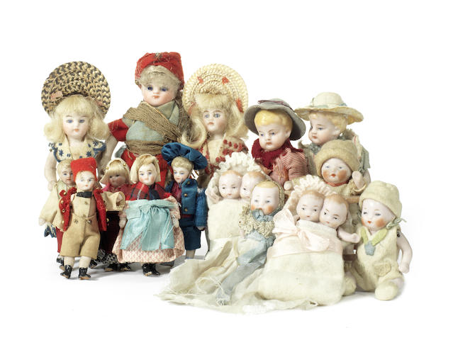 Appraisal: Collection of miniature all-bisque dolls Including glass eye girl with