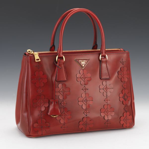 Appraisal: PRADA RED SPAZZOLATO FLOWERS GALLERIA HANDBAG x x Red patent