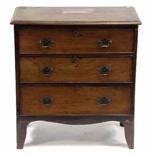 Appraisal: A mahogany chest fitted with three long drawers cm wide