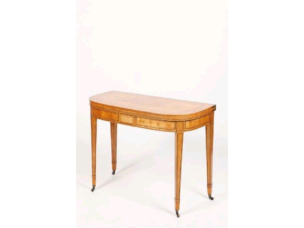 Appraisal: A GEORGE III SATINWOOD CARD TABLE the fold top with