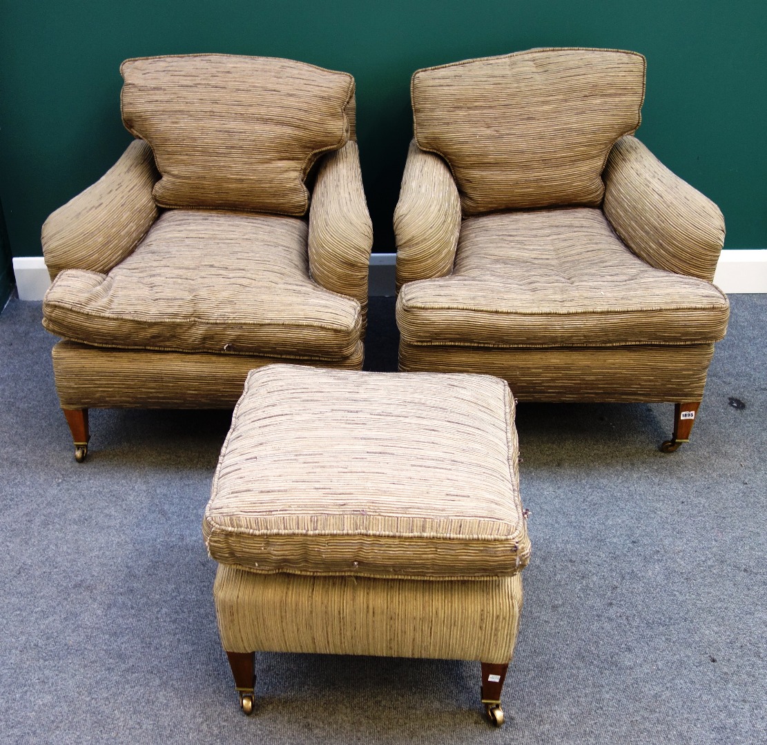 Appraisal: A pair of th century easy armchairs on tapering square