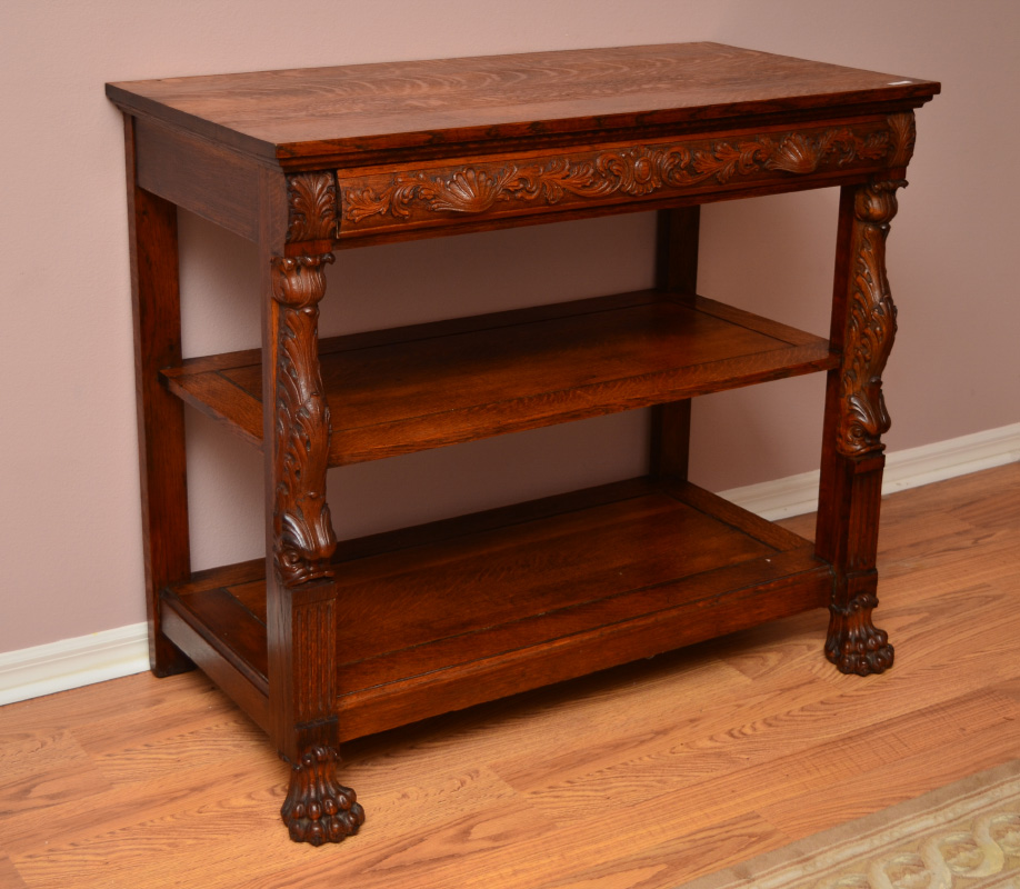 Appraisal: VICTORIAN CARVED TIER OAK SERVER Single drawer with carved foliated