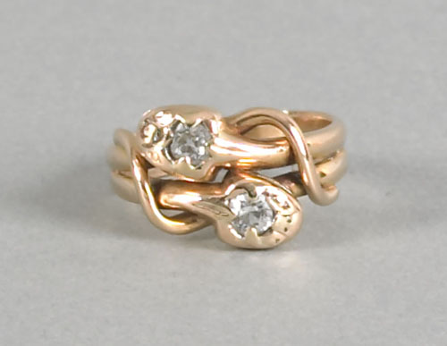 Appraisal: K yellow gold and diamond ring with entwined snakes each