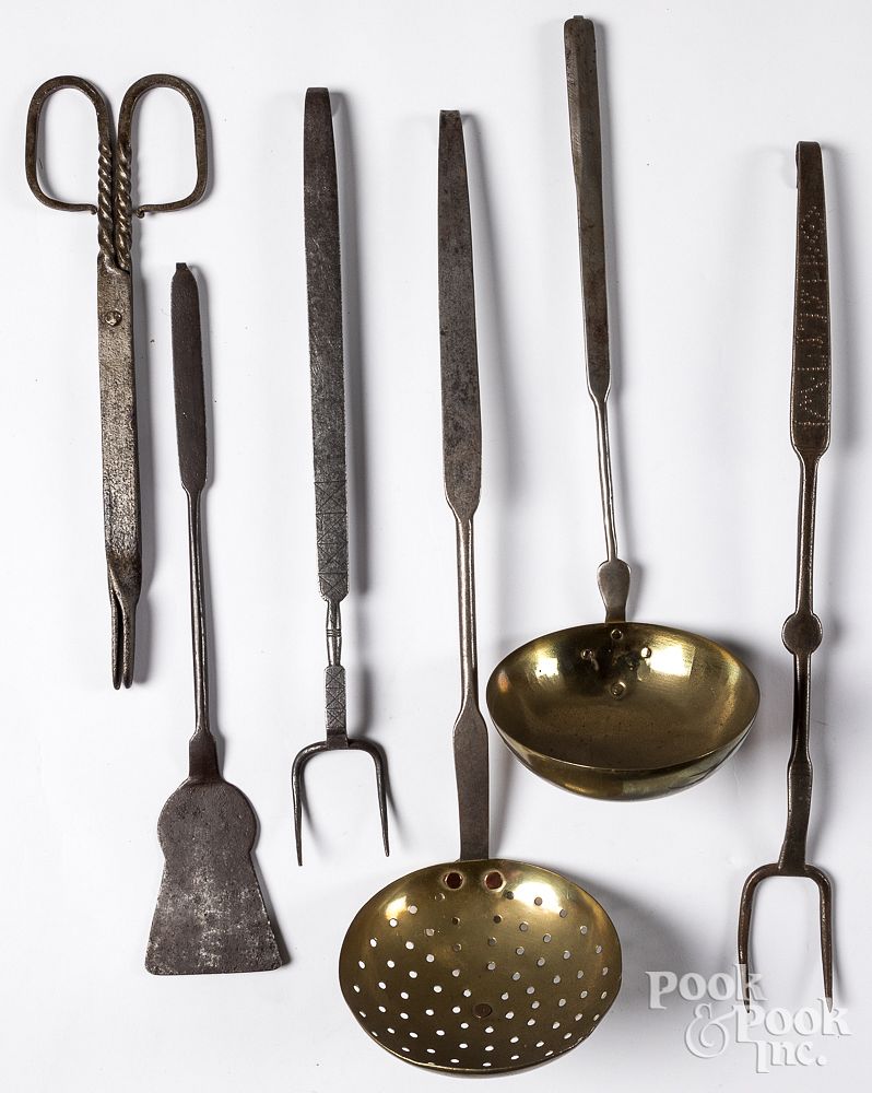 Appraisal: Wrought iron long handled utensils th c Wrought iron long