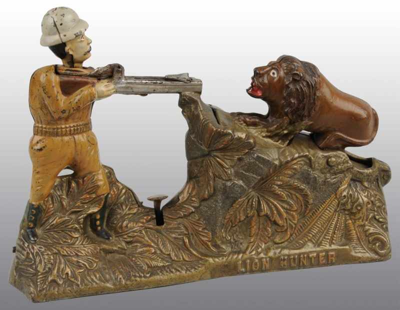 Appraisal: Cast Iron Lion Hunter Mechanical Bank Description Manufactured by J