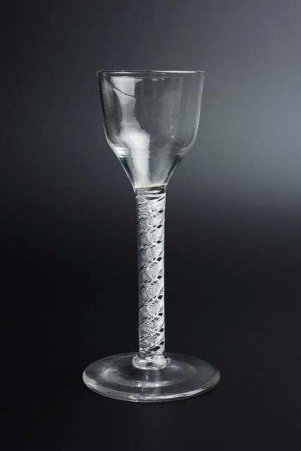 Appraisal: AN TH CENTURY WINE GLASS with slightly tapering ogee bowl