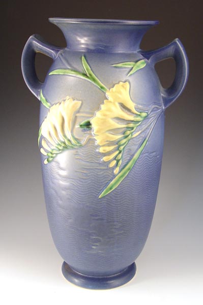 Appraisal: TALL ROSEVILLE POTTERY ZEPHYR LILY VASE Blue '' high shape