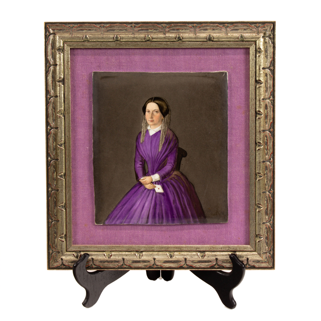 Appraisal: A CONTINENTAL PAINTED PORCELAIN PORTRAIT PLAQUE OF A WOMAN TH