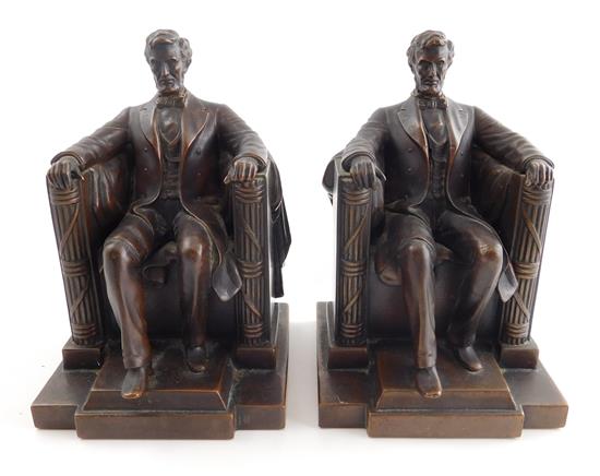 Appraisal: Jennings Bros Abraham Lincoln bookends seated figure of Lincoln after