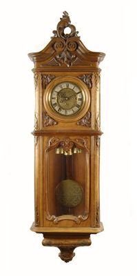 Appraisal: A carved walnut three train regulator wall clock by Gustav