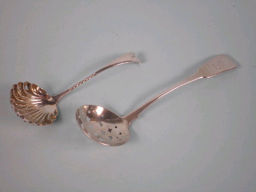 Appraisal: A Georgian silver fiddle pattern sifter spoon possibly Edinburgh and