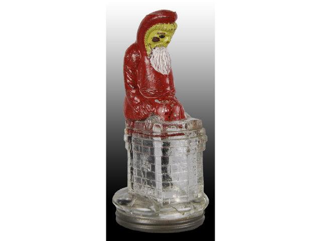 Appraisal: Glass Santa Candy Container Description Santa at chimney Nice original