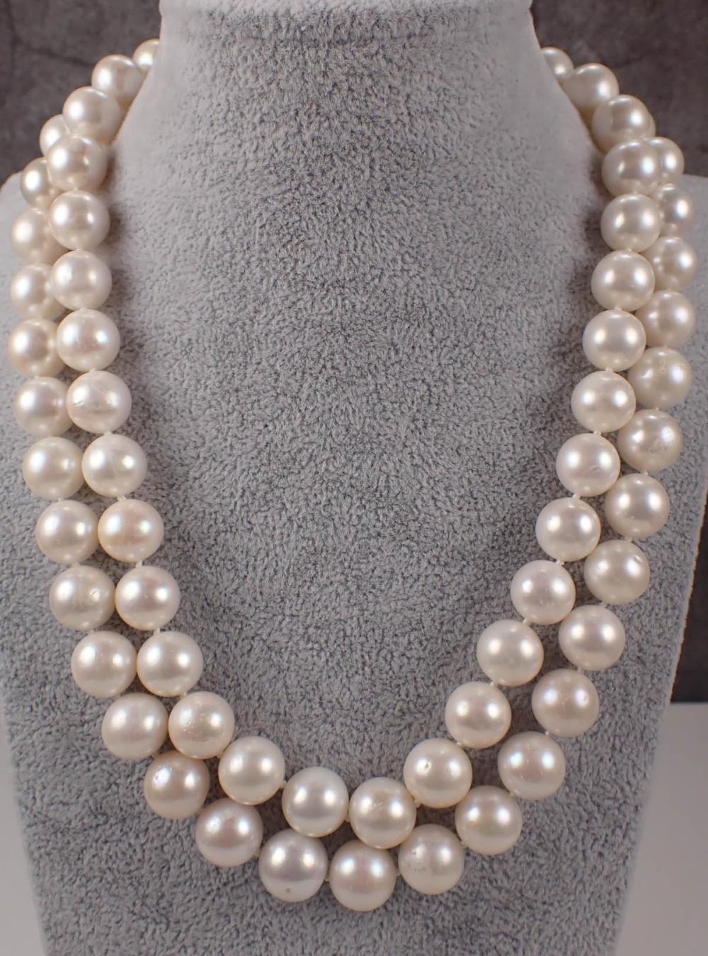 Appraisal: DOUBLE STRAND SOUTH SEA PEARL NECKLACE The hand-knotted double strand