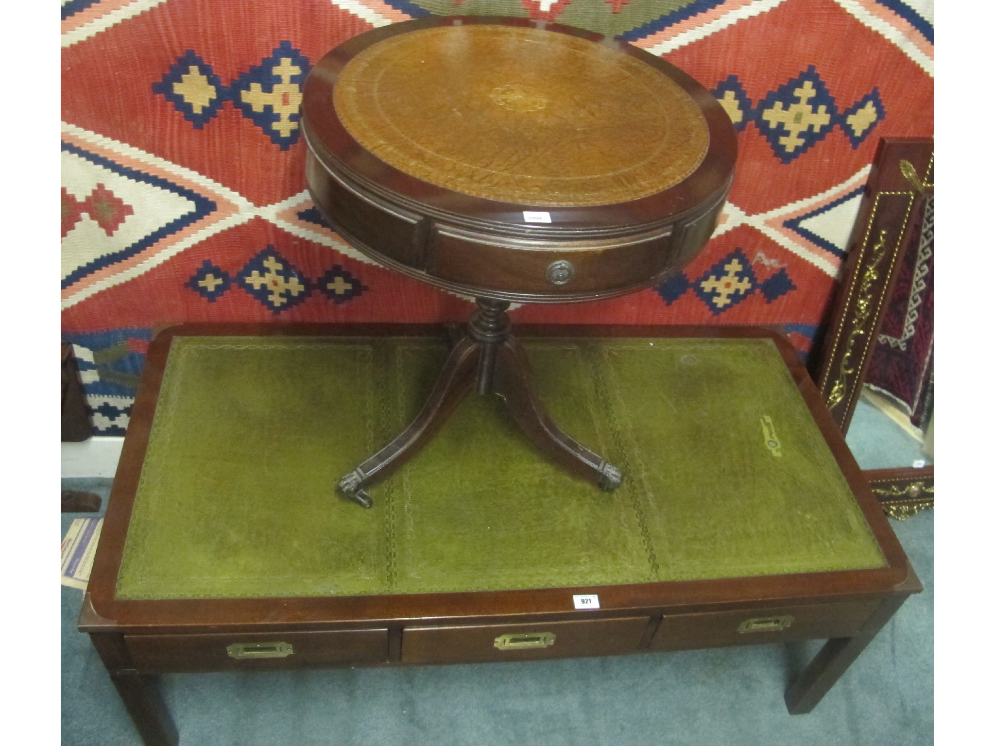 Appraisal: A mahogany faux leather topped table and another