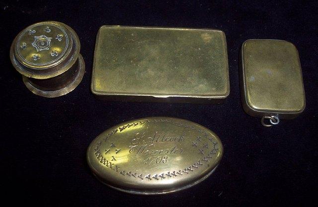 Appraisal: A brass snuff box of oval shape engraved S Allcock