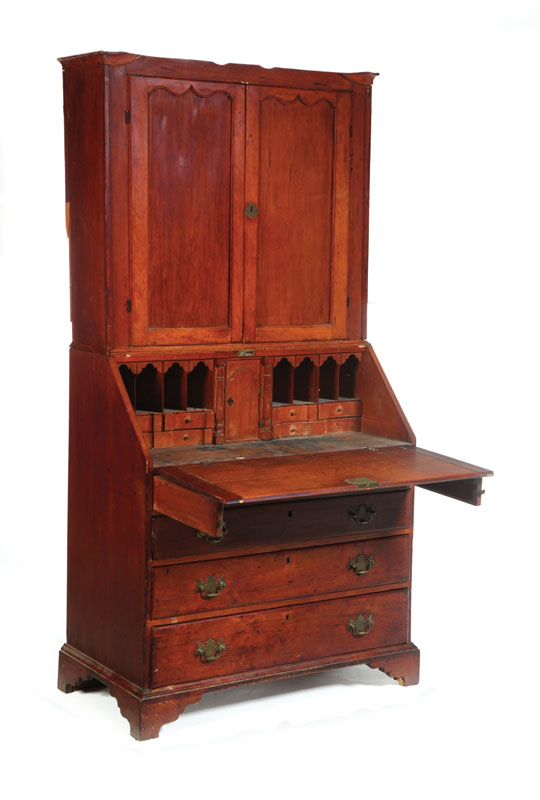 Appraisal: CHIPPENDALE DESK-AND-BOOKCASE American late th century cherry and pine Two-piece