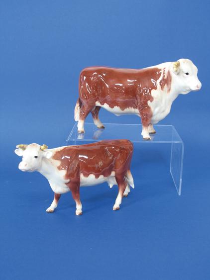 Appraisal: A BESWICK PORCELAIN MODEL OF A BROWN AND WHITE BULL