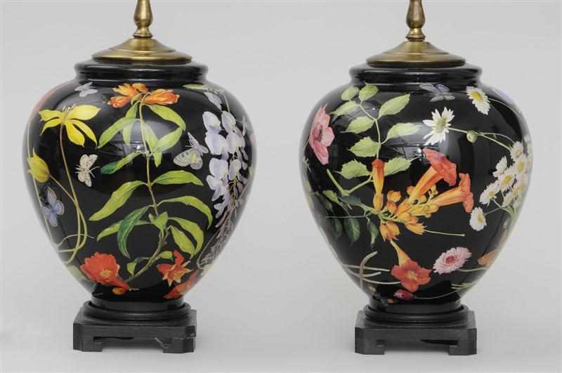 Appraisal: PAIR OF BLACK-GROUND DECOUPAGE GLASS TABLE LAMPS Each ovoid bowl