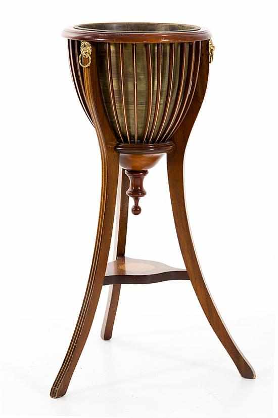 Appraisal: George III style inlaid mahogany jardiniere circular molded top over