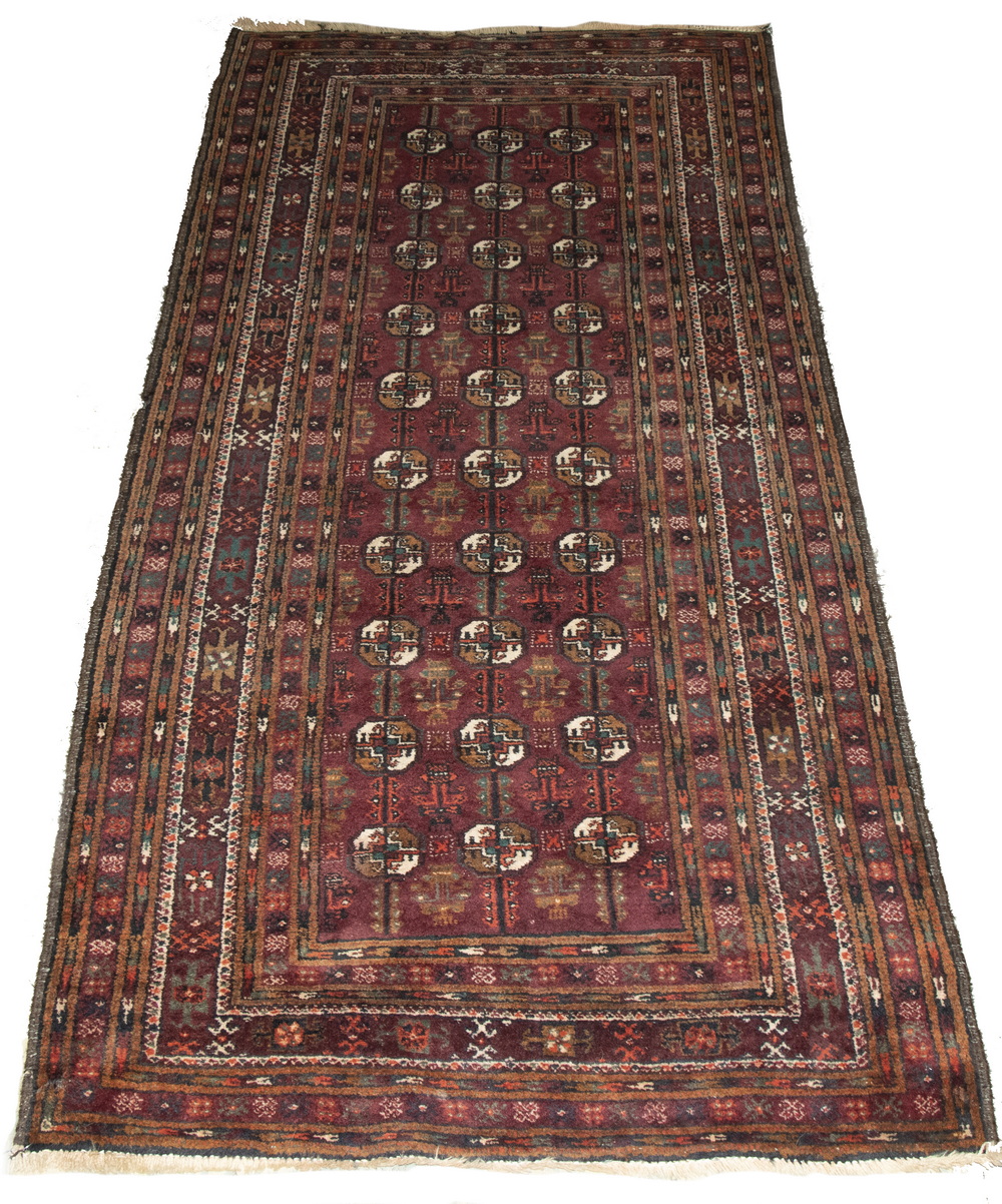 Appraisal: BALUCH RUNNER ' X ' Baluch runner Northeast Persia Three