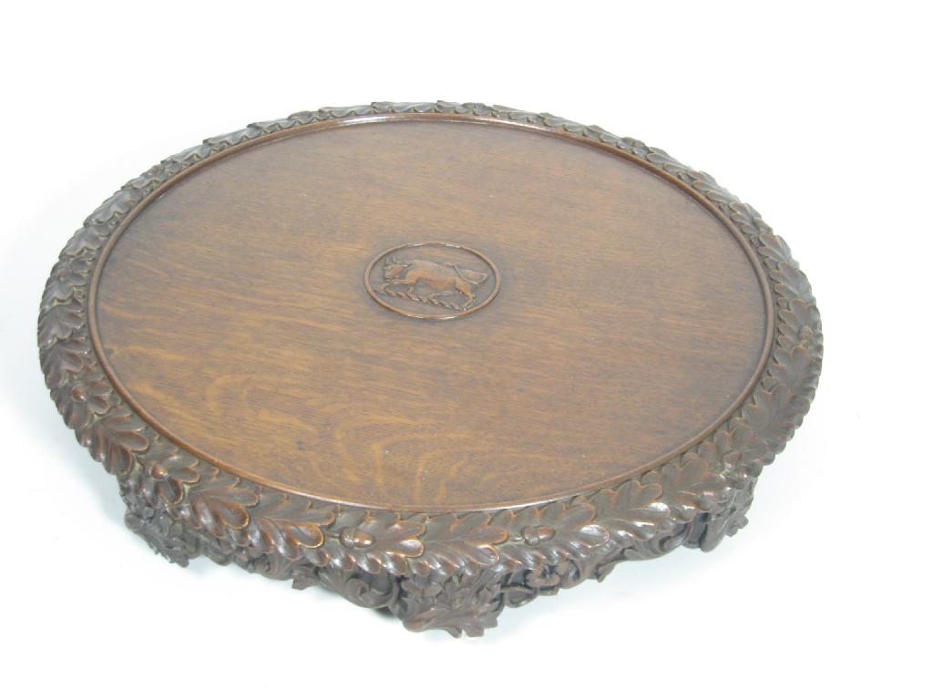 Appraisal: A Victorian Pugin style carved oak circular Revolving Susan with