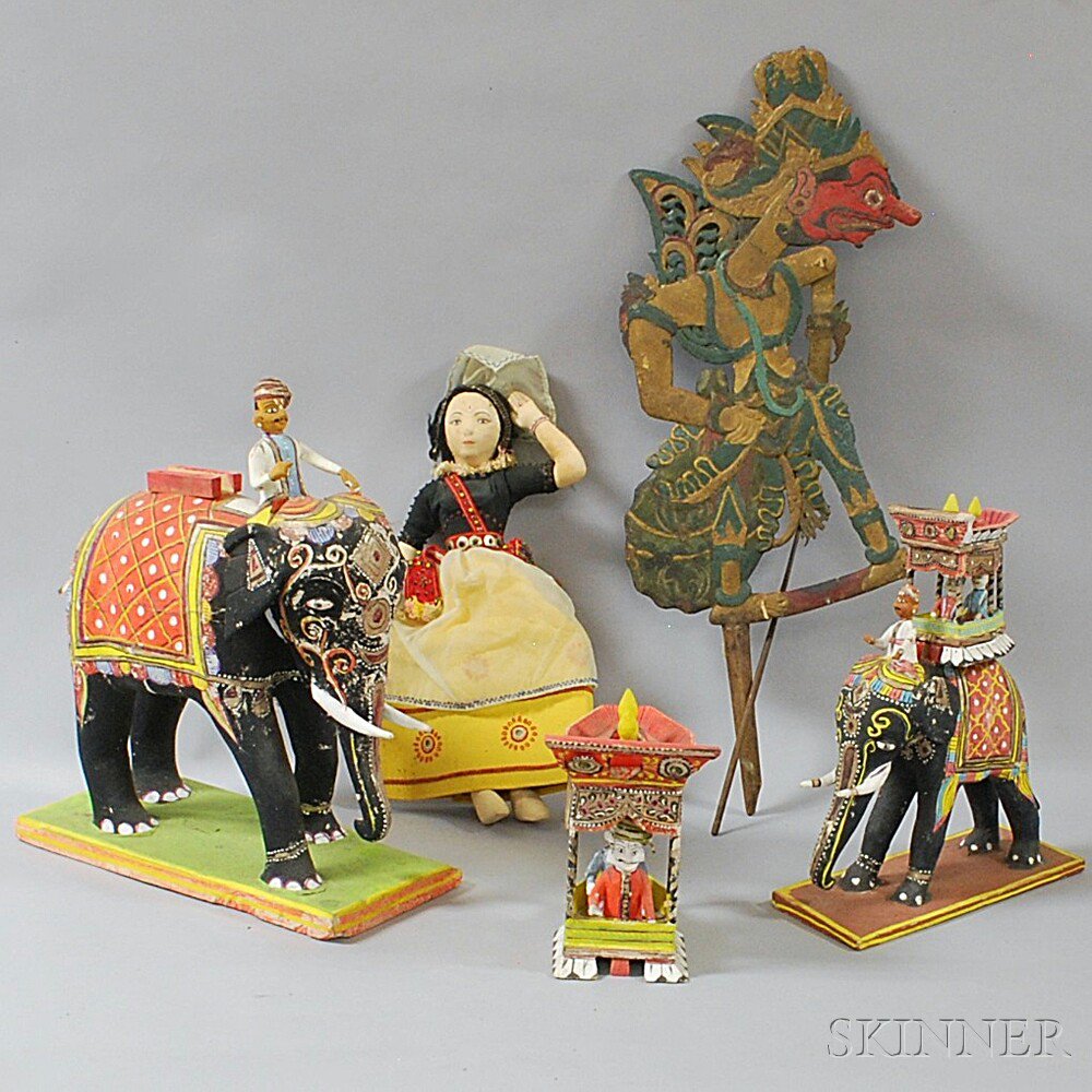 Appraisal: Four Mostly Indian Papier-mache Toys two elephants with riders a