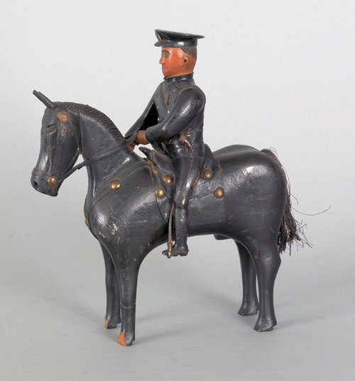 Appraisal: Carved figure of a policeman on horseback late th early