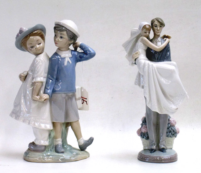 Appraisal: TWO LLADRO PORCELAIN FIGURINES Over the Threshold Juan Huerta sculptor