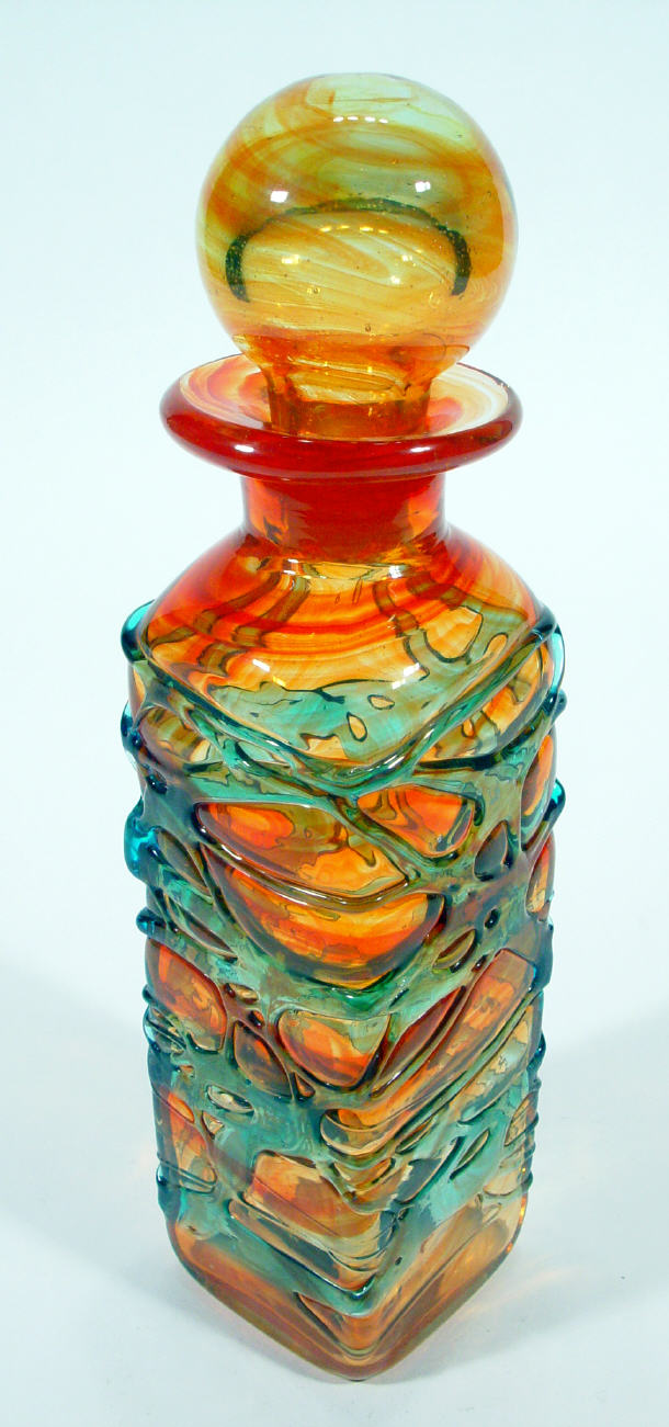 Appraisal: Square Medina glass bottle and stopper with blue and red