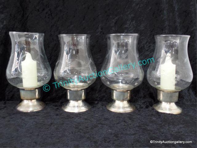 Appraisal: International Silver Etched Glass Hurricane Lamps This is for a