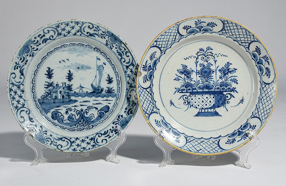 Appraisal: Two th C Delft chargers Two th C Delft chargers