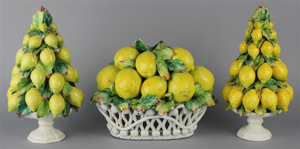 Appraisal: THREE ITALIAN POTTERY LEMON TABLE ORNAMENTS two pyramids - h