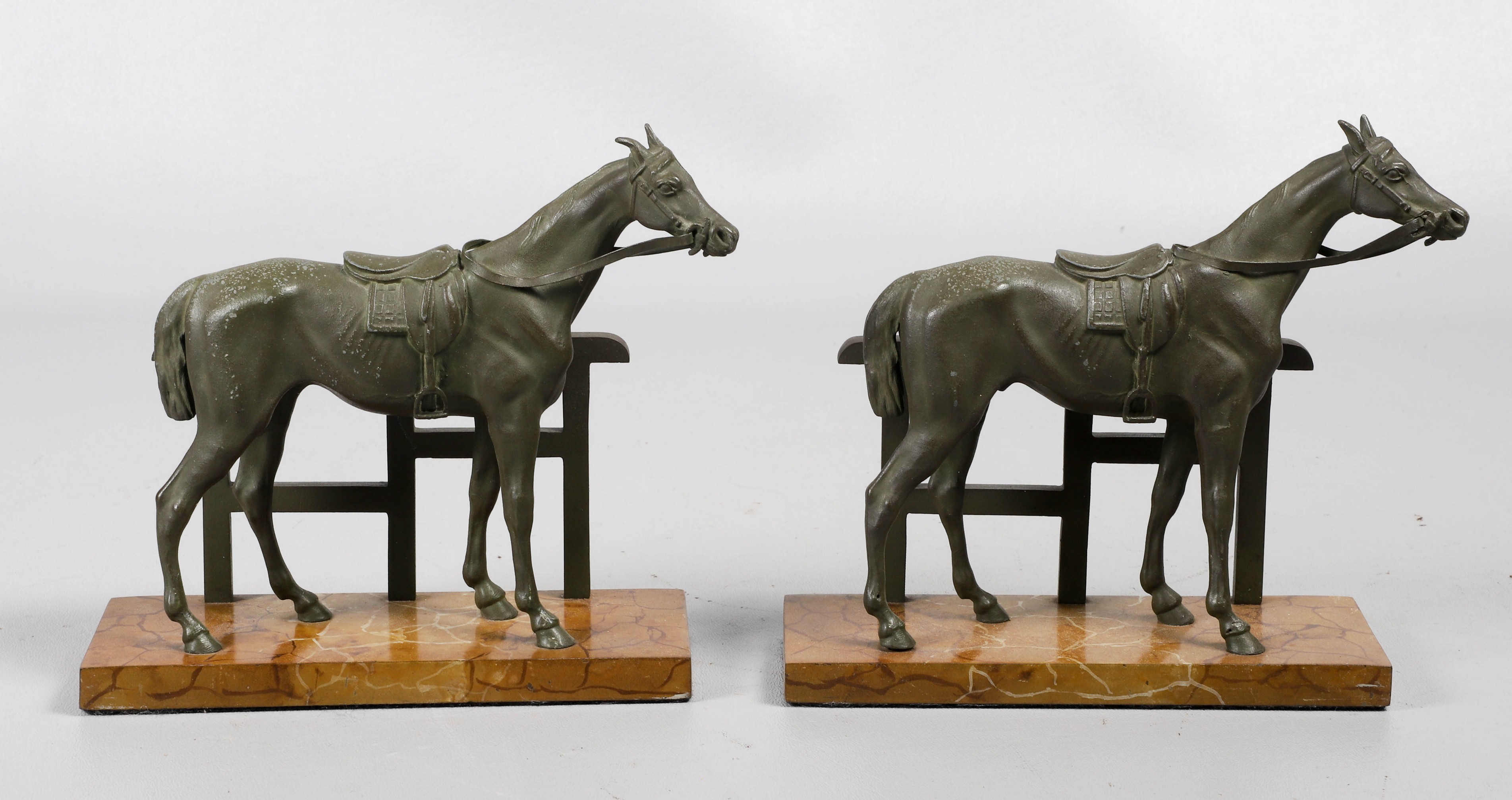 Appraisal: Pair Cast metal horse bookends cast white metal horses and