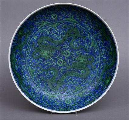 Appraisal: CHINESE BLUE-GROUND PORCELAIN SHALLOW BOWL With green scaly dragons and