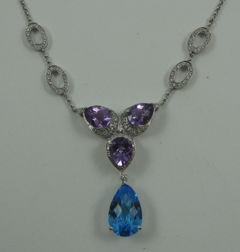 Appraisal: BLUE TOPAZ AMETHYST AND DIAMOND PENDANT NECKLACE K white gold