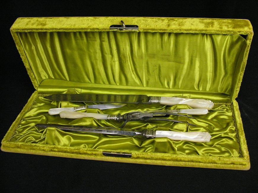 Appraisal: MOTHER OF PEARL CARVING SET Was a wedding present in