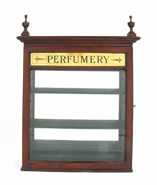 Appraisal: A pair of display cases labeled 'Perfume' height width in