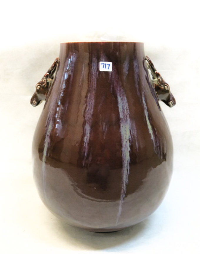 Appraisal: CHINESE PORCELAIN VASE a Hu-shaped vessel with oxblood flambe glaze